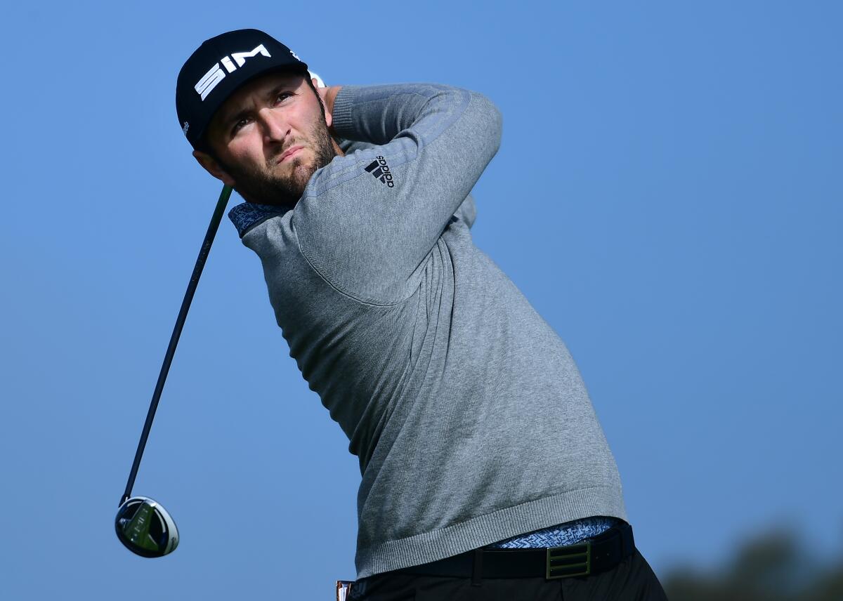 Jon Rahm tees off on the South Course at Torrey Pines in the third round of the Farmers Insurance Open on Jan. 25, 2020.