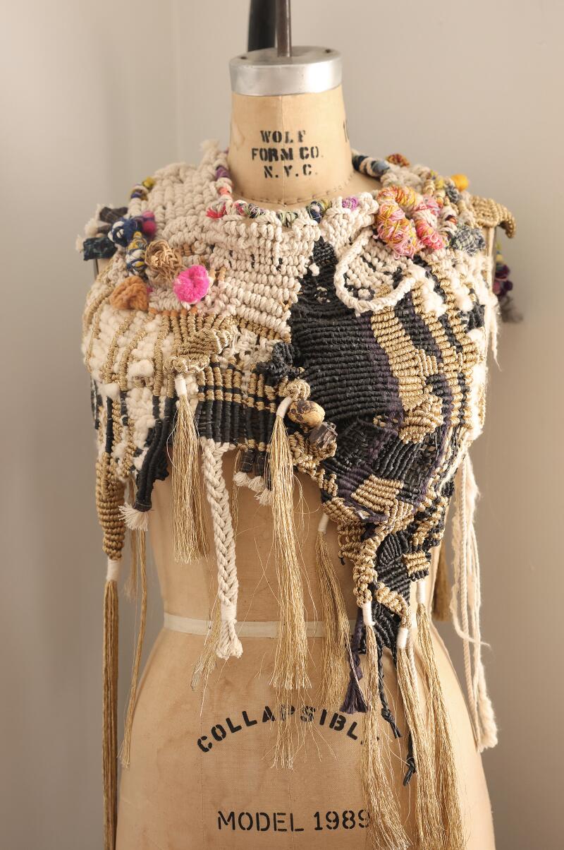 A woven hood in a mannequin
