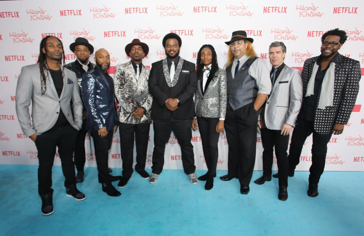 Craig Robinson, center, and his band, the Nasty Delicious, attend Seth Rogen's Hilarity for Charity event at the Hollywood Palladium on March 24.