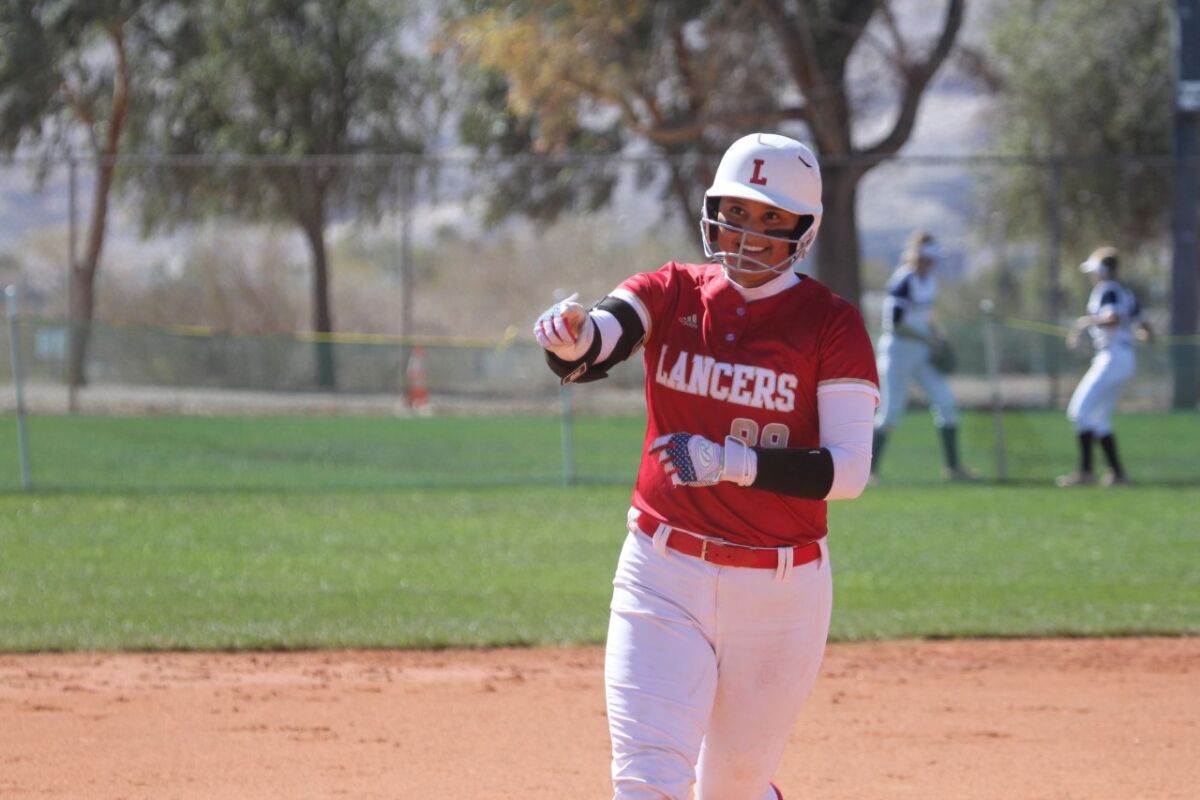 Kiki Estrada from Orange Lutheran is The Times' softball player of the year for 2022.