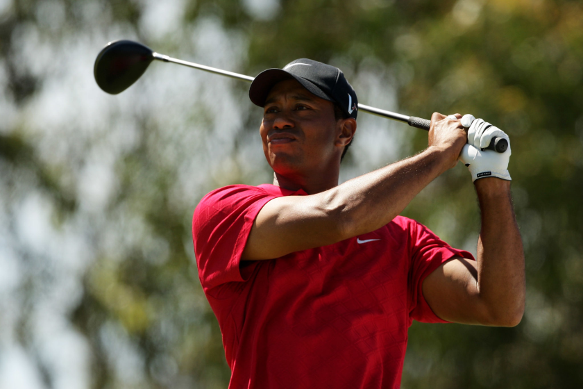 MELBOURNE, AUSTRALIA - NOVEMBER 15: Tiger Woods of the USA tees off on the 12th hole.