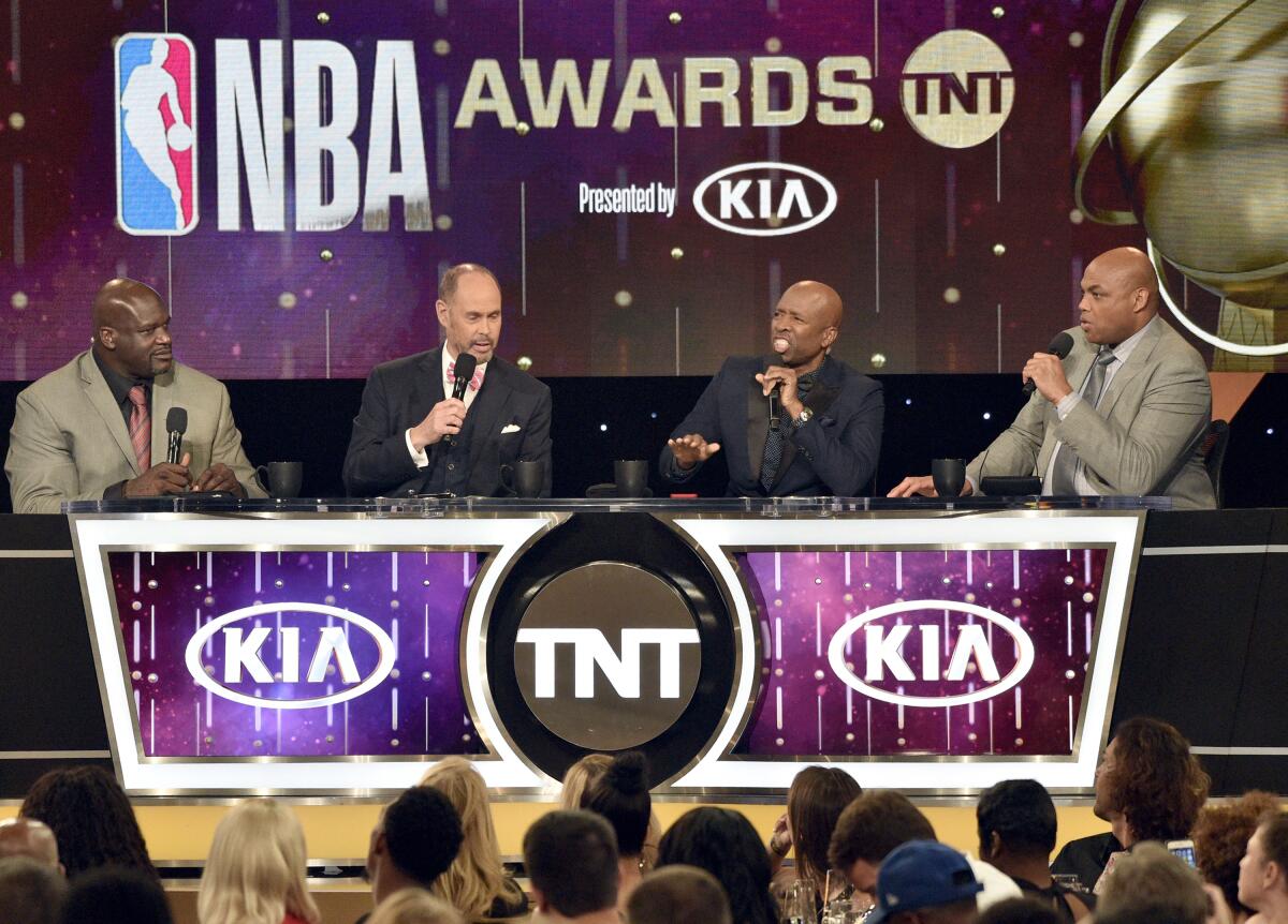 From left, Shaquille O'Neal, Ernie Johnson, Kenny Smith and Charles Barkley speaking at the NBA Awards 