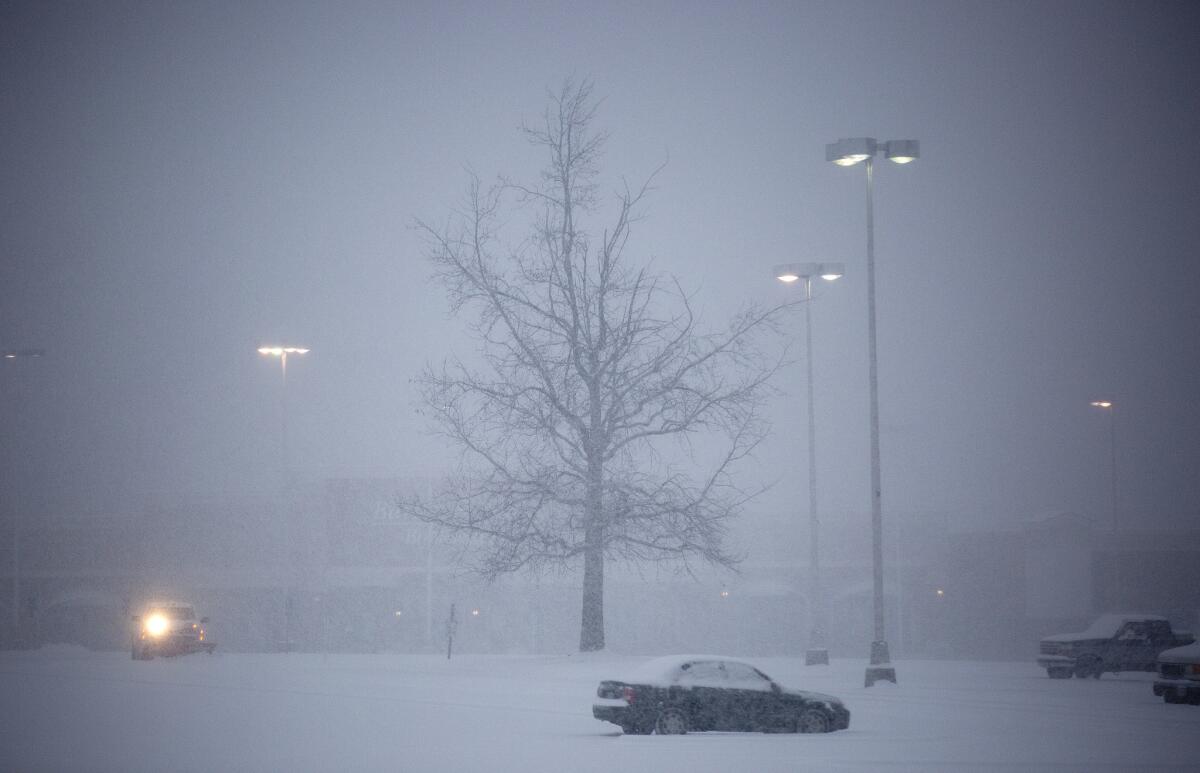 Tanglewood Mall and a parking area in southwest Roanoke County, Va., as the storm descends.