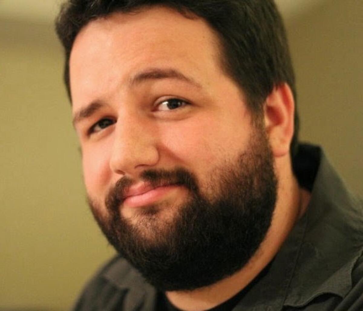 A bearded man headshot