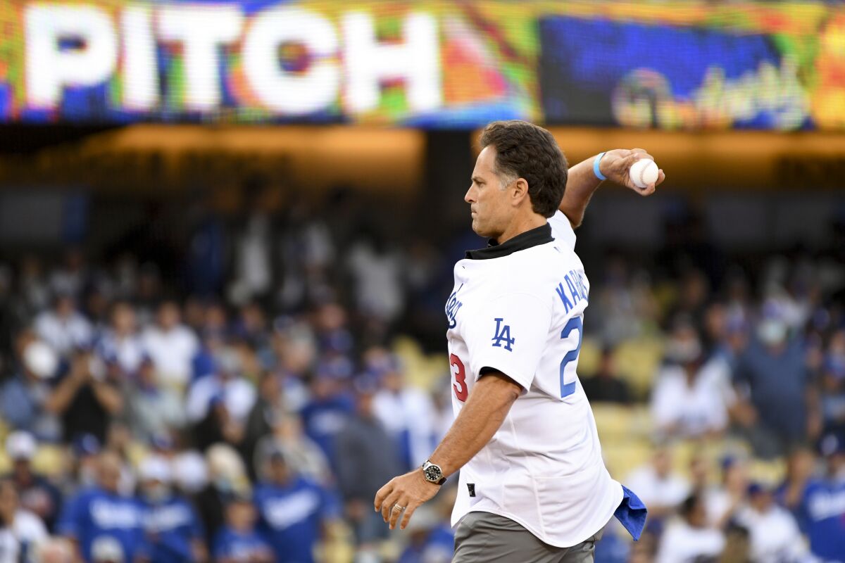 Eric Karros throws out the first pitch before Game 4 of the 2021 NLCS.