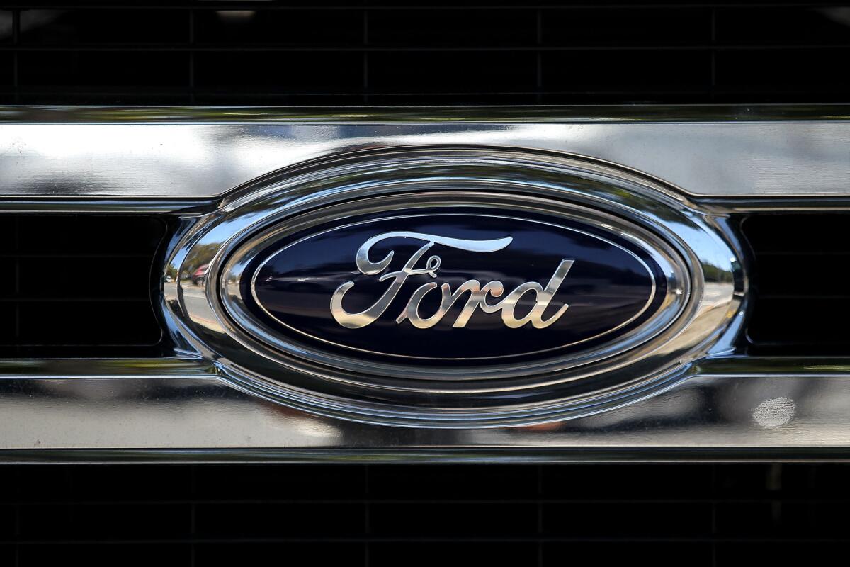 Ford Motor Co. said Tuesday it was recalling 26,400 vehicles in North America because of an issue with the seat belt anchorage.