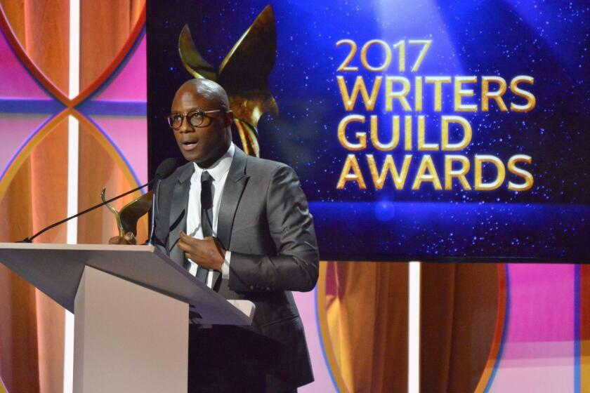 Director Barry Jenkins accepts the original screenplay award for "Moonlight" during the 2017 Writers Guild Awards ceremony.