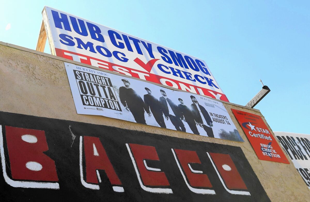 A poster for "Straight Outta Compton," a new film about the rise and fall of rap group N.W.A, is on display in Compton.