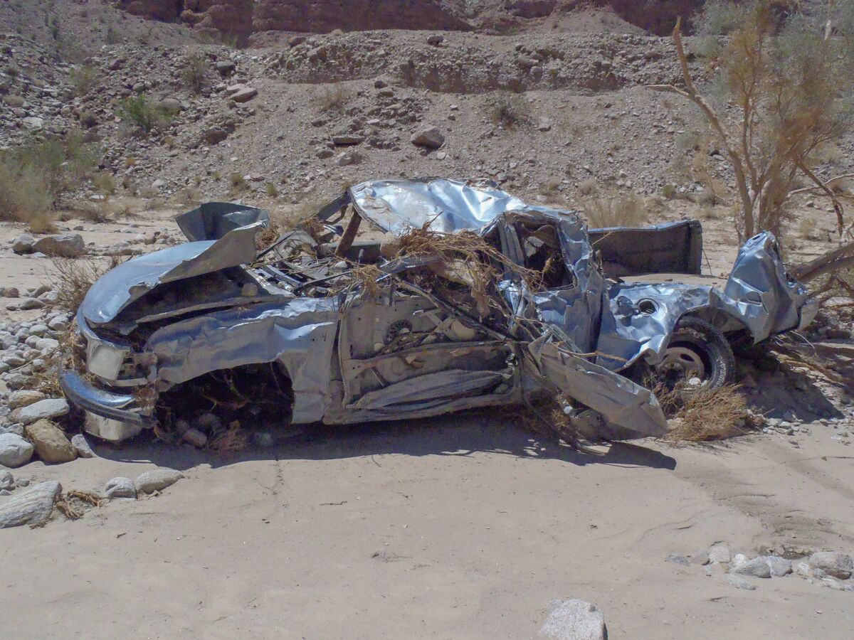 A truck that was swept through Split Mountain by a flash flood.