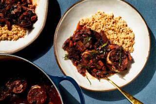 LOS ANGELES, CA - SEPTEMBER 8, 2022: Eggplant bourguignon and pearl couscous, prepared by cooking columnist Ben Mims on September 8, 2022 in the LA Times test kitchen. (Katrina Frederick / For The Times)