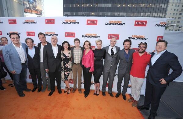 "Arrested Development" streams on Netflix starting May 26. The show took a seven-year break before being revived by the company. Here, producer Mitchell Hurwitz, left, producer Brian Grazer, actor Will Arnett, actor Jeffrey Tambor, actress Alia Shawkat, actor Michael Cera, actress Jessica Walter, actress Portia de Rossi, actor Tony Hale, actor Jason Bateman, actor David Cross and Ted Sarandos, chief content officer of Netflix arrive at the Los Angeles premiere.