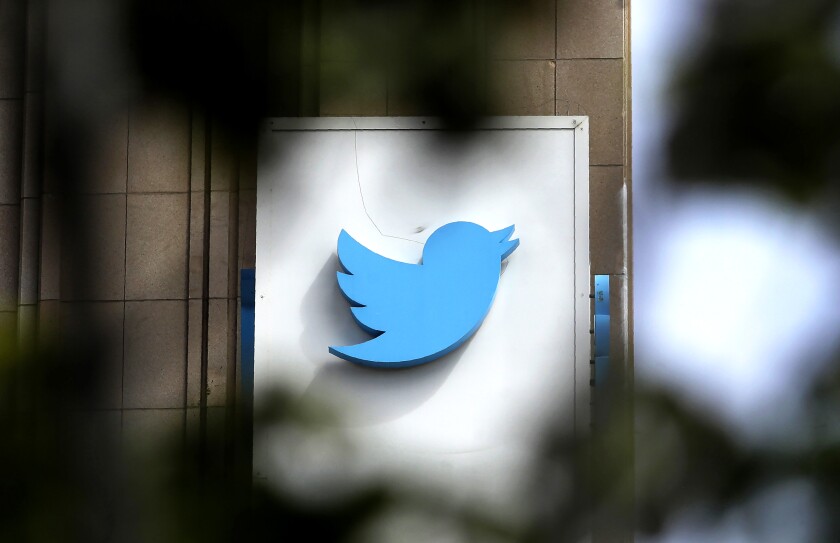 FILE.  This July 9, 2019 file photo shows a sign outside the Twitter office building in San Francisco. 