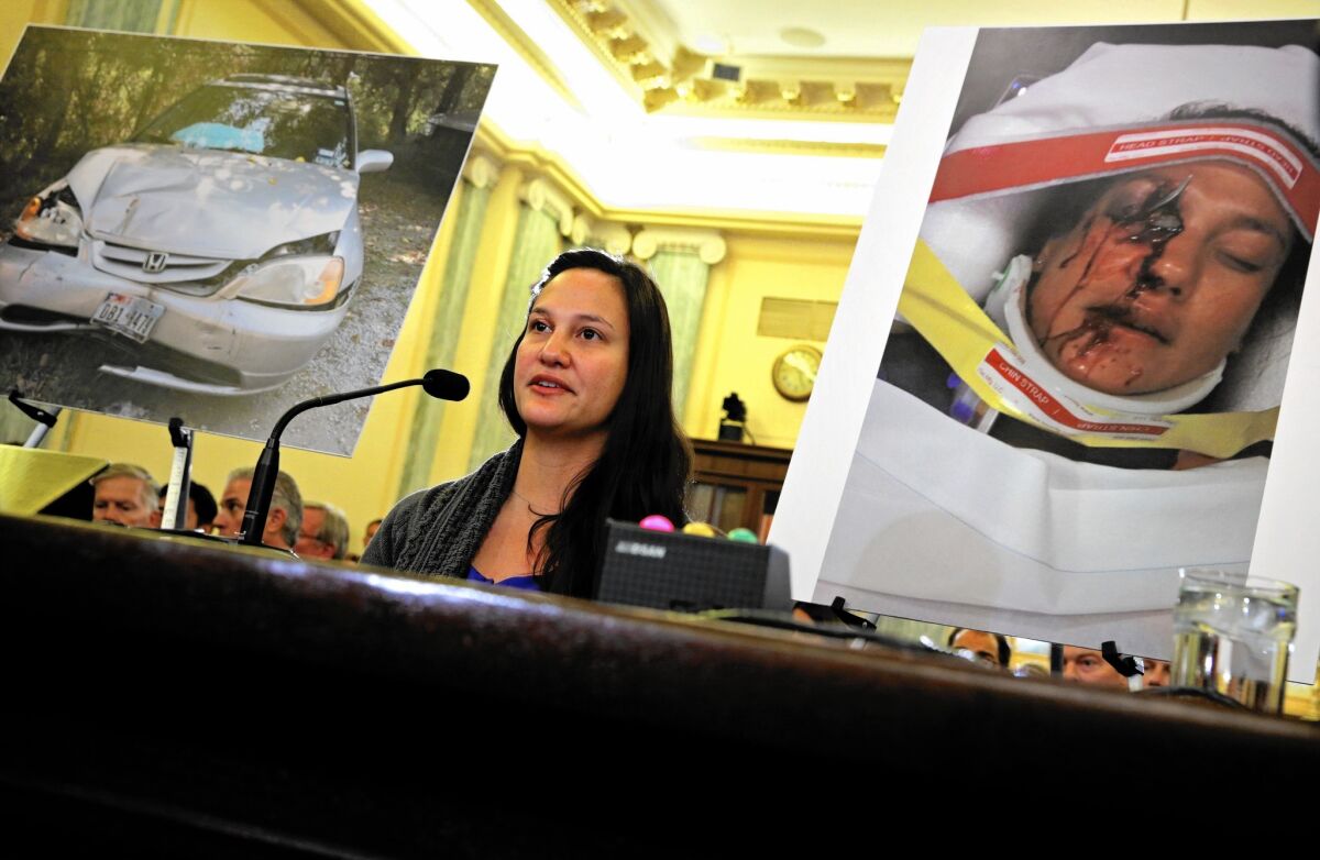 Stephanie Erdman of Destin, Fla., who was seriously injured by the air bag explosion in her Honda Civic during a traffic accident, testifies before the Senate Commerce, Science and Transportation Committee in 2014.