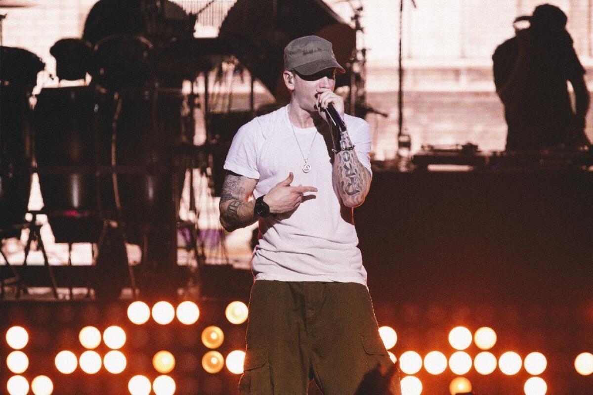 Eminem performs at the G-SHOCK 30th anniversary event Aug. 7, 2013, in New York.