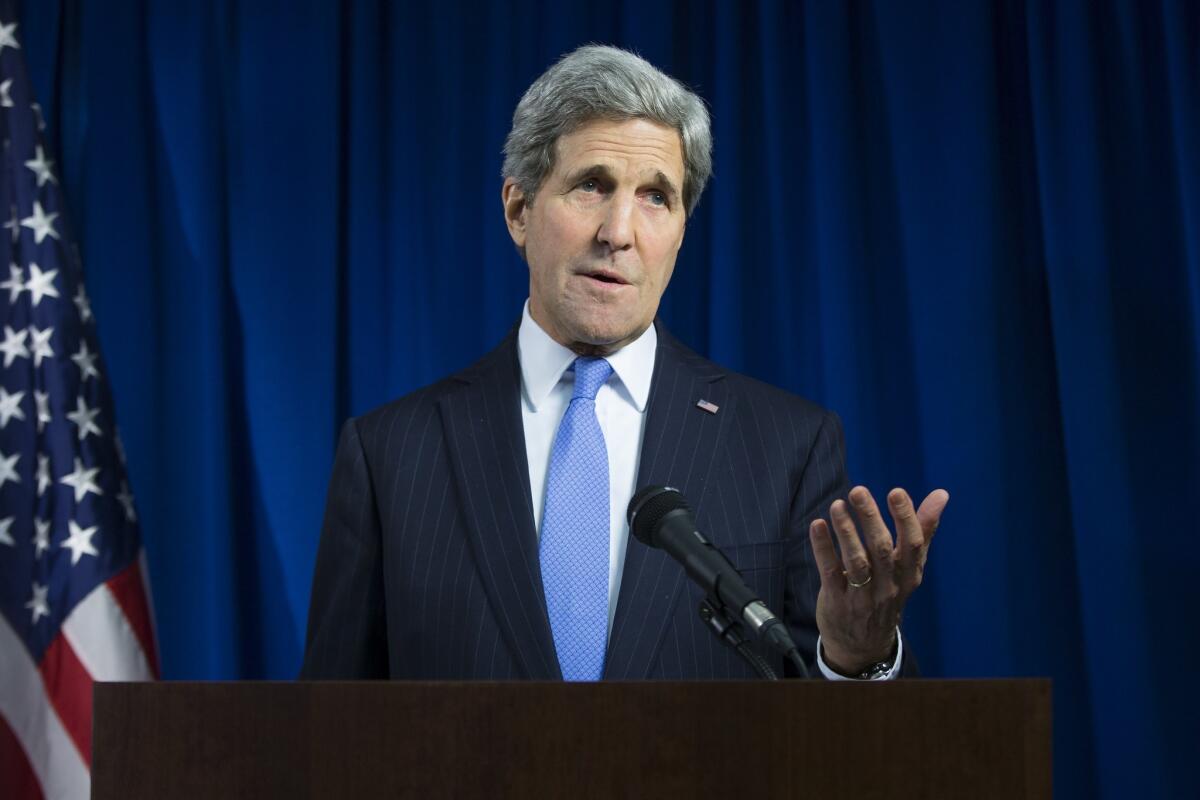 Secretary of State John Kerry speaks Tuesday during a news conference at the U.S. Embassy in London.