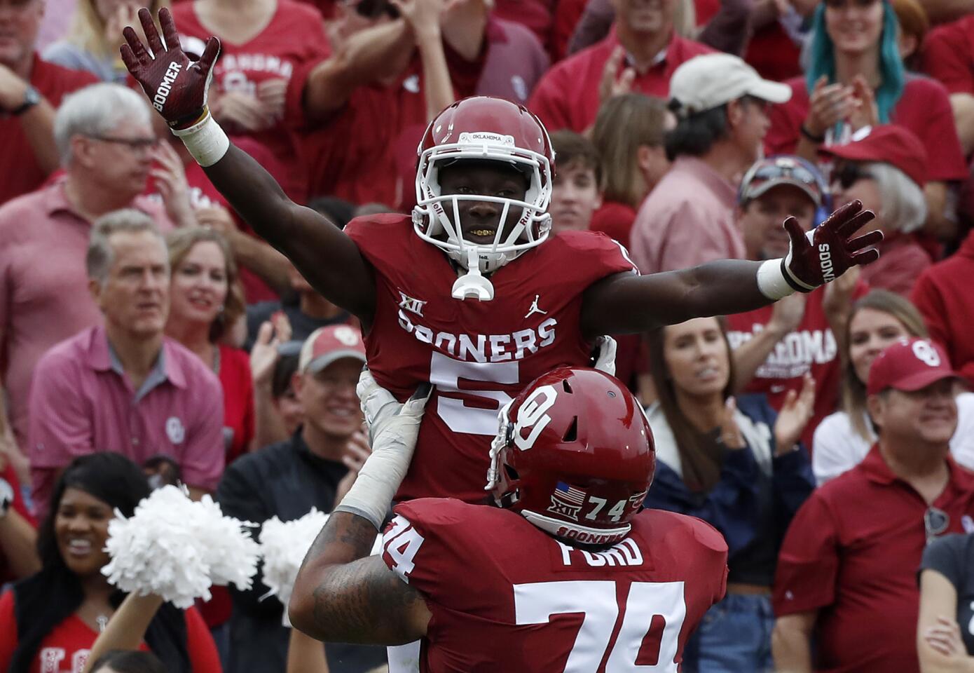 Marquise Brown, Cody Ford