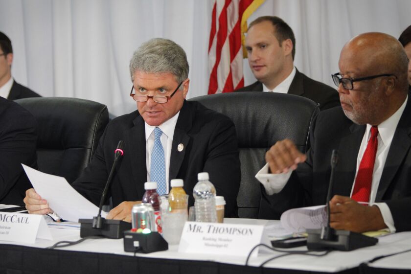 Rep. Michael McCaul (R-Texas), left, and Rep. Bennie Thompson (D-Miss.) preside over a hearing of the House Committee on Homeland Securty on the federal, state and local response to the Ebola case in Dallas.