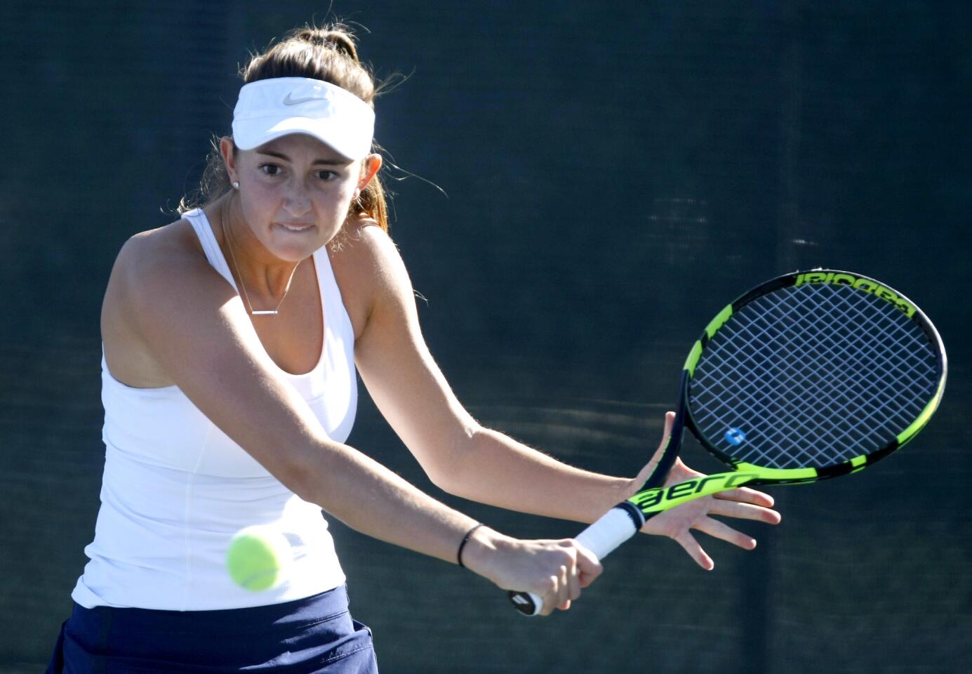 Corona Del Mar High School's singles tennis player Jasie Dunk returns the ball in play vs. Mayfair's Brianna Figueroa in the CIF SS Girls Individual Tennis Championships, Round of 32, at Whittier Narrows Tennis Center in South El Monte, on Tuessay, Nov. 29, 2016. Dunk won her match 6-1, 6-0.