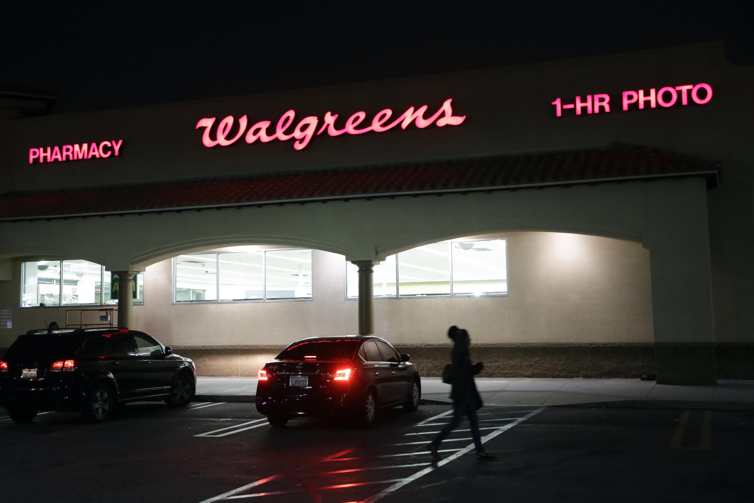 A Walgreens seen at night 