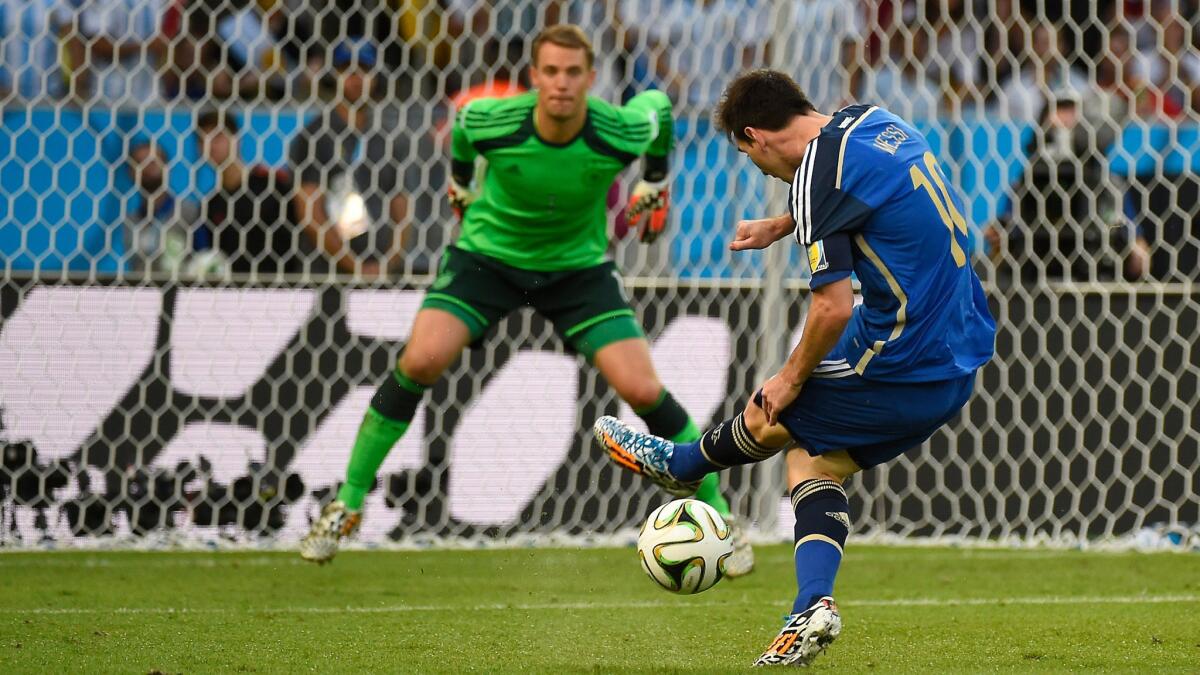 Germany goalkeeper Manuel Neuer, left, makes a save on a shot by Argentina forward Lionel Messi during Germany's 1-0 win in the World Cup final Sunday. Argentina failed to capitalize on its scoring opportunities against Germany.