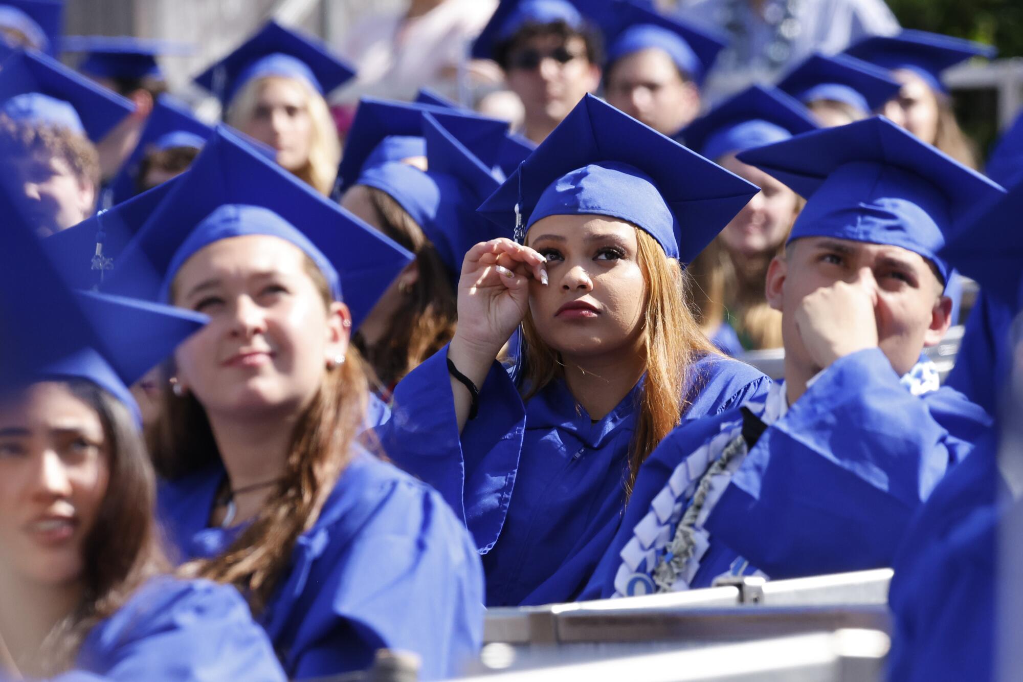 Pali students watch a video on the Hollywood Bowl's jumbo screens.