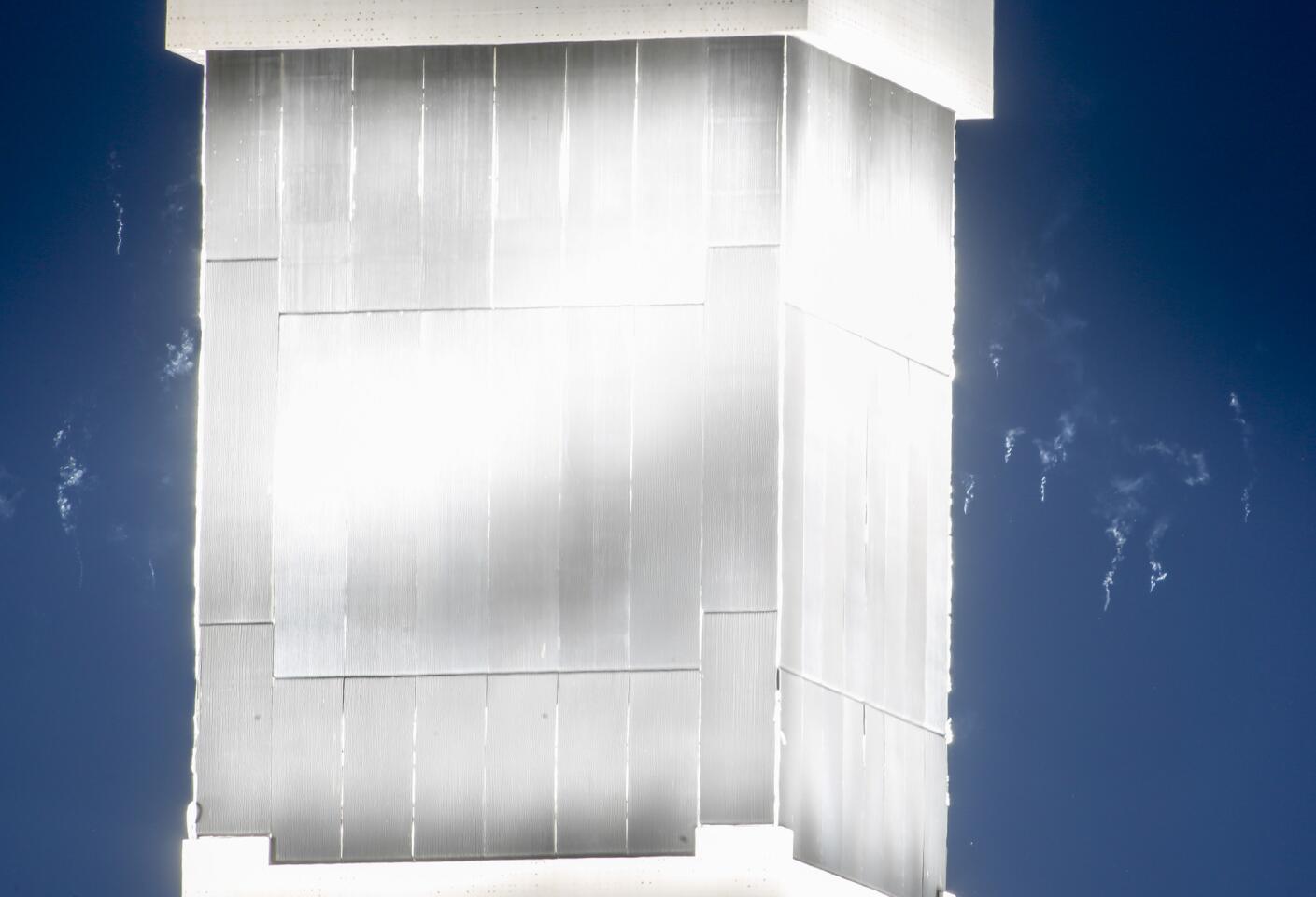 Dead insects and possibly birds fall to the ground in trails of smoke that plant workers call "streamers" after flying too close to a giant boiler at the Ivanpah solar power station near the California/Nevada border