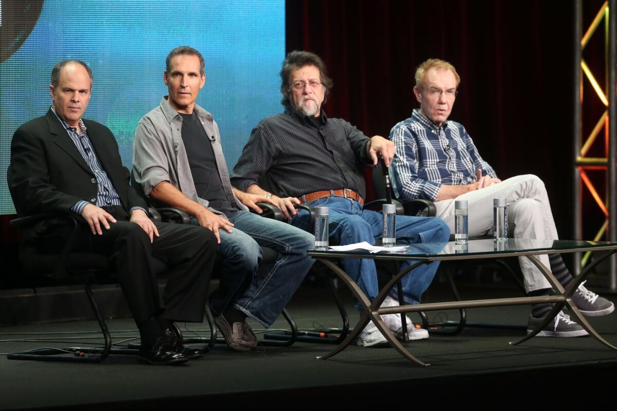 Executive producer Michael Kantor, from left, and comic book writers Todd McFarlane, Len Wein and Gerry Conway talk about the PBS docu-series 'Superheroes: A Never-Ending Battle' at the Summer Television Critics Assn. tour at the Beverly Hilton Hotel on Aug. 7 in Beverly Hills.