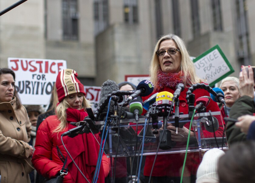 Actress Louise Godbold, who has accused Harvey Weinstein of sexual misconduct, speaks outside the court on the first day of his criminal trial in New York City. She is joined by Weinstein accusers Rosanna Arquette, left, and Rose McGowan, right.