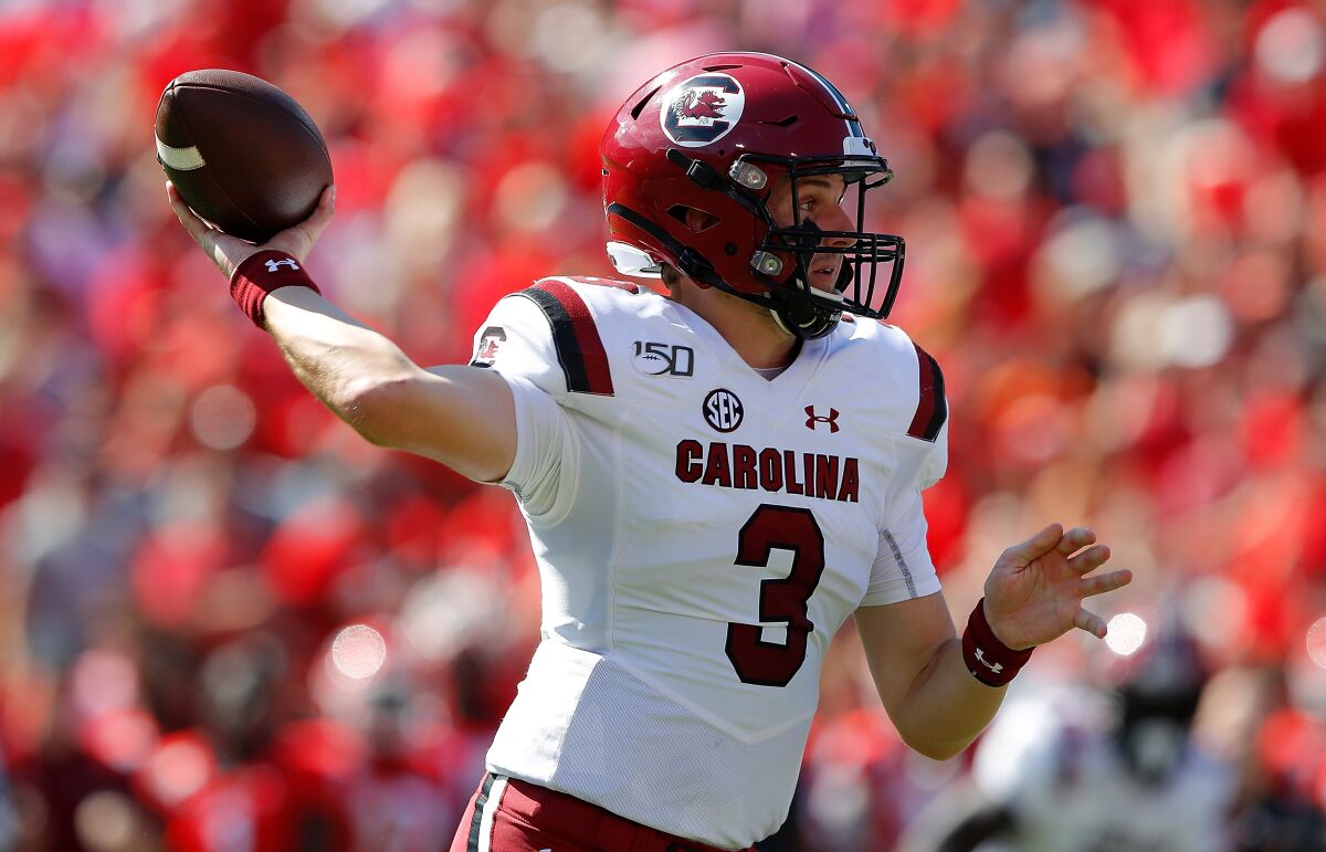 South Carolina's Ryan Hilinski prepares to throw a pass against Georgia.
