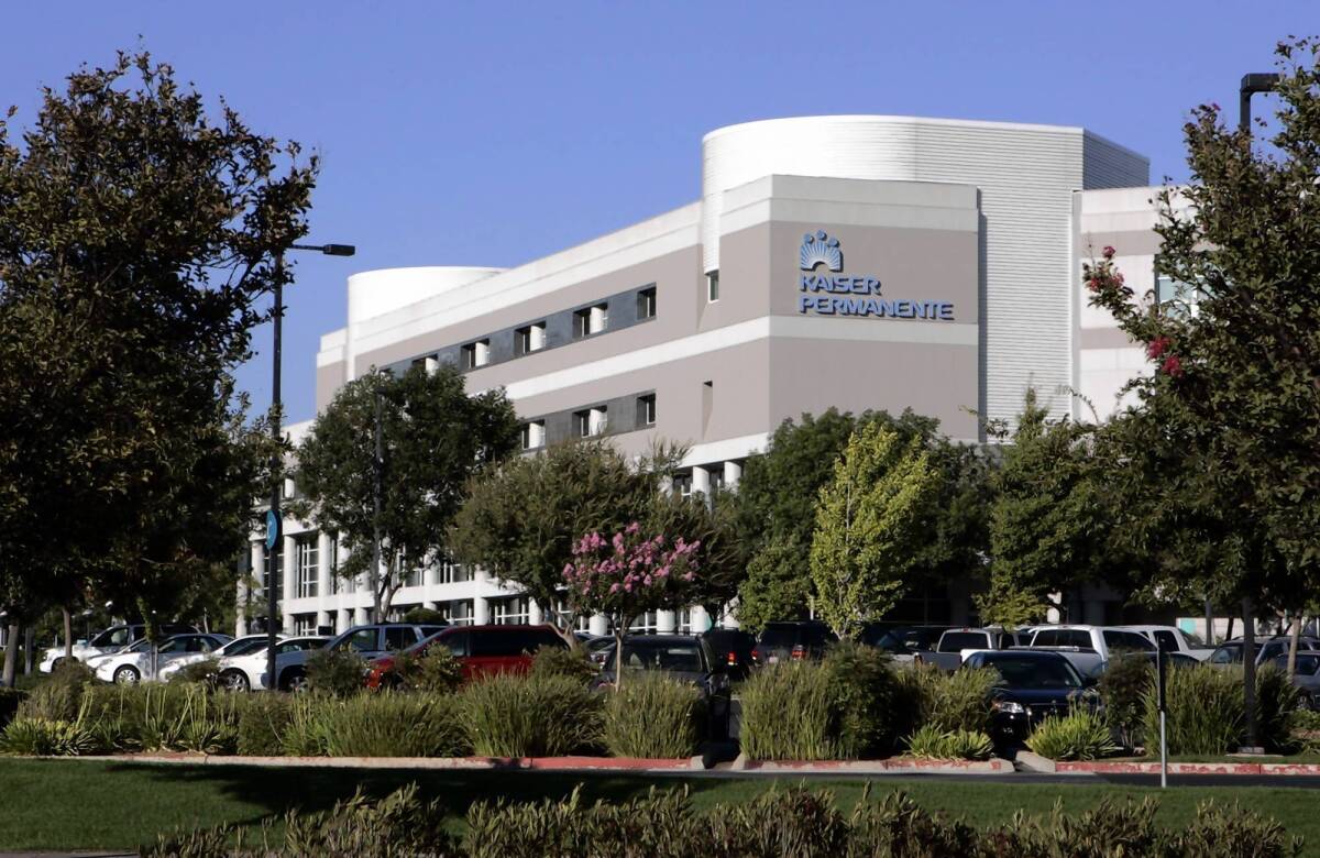 Despite its higher rates, Kaiser Permanente said it wants to enroll a large number of people in the state exchange. Above, a Kaiser hospital in Fresno.