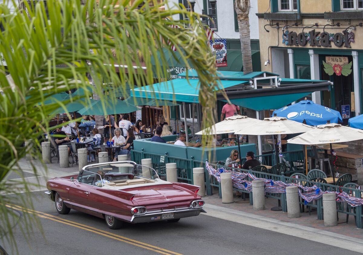 Restaurants and other businesses in Orange County are not required to tell customers about coronavirus cases among staff.