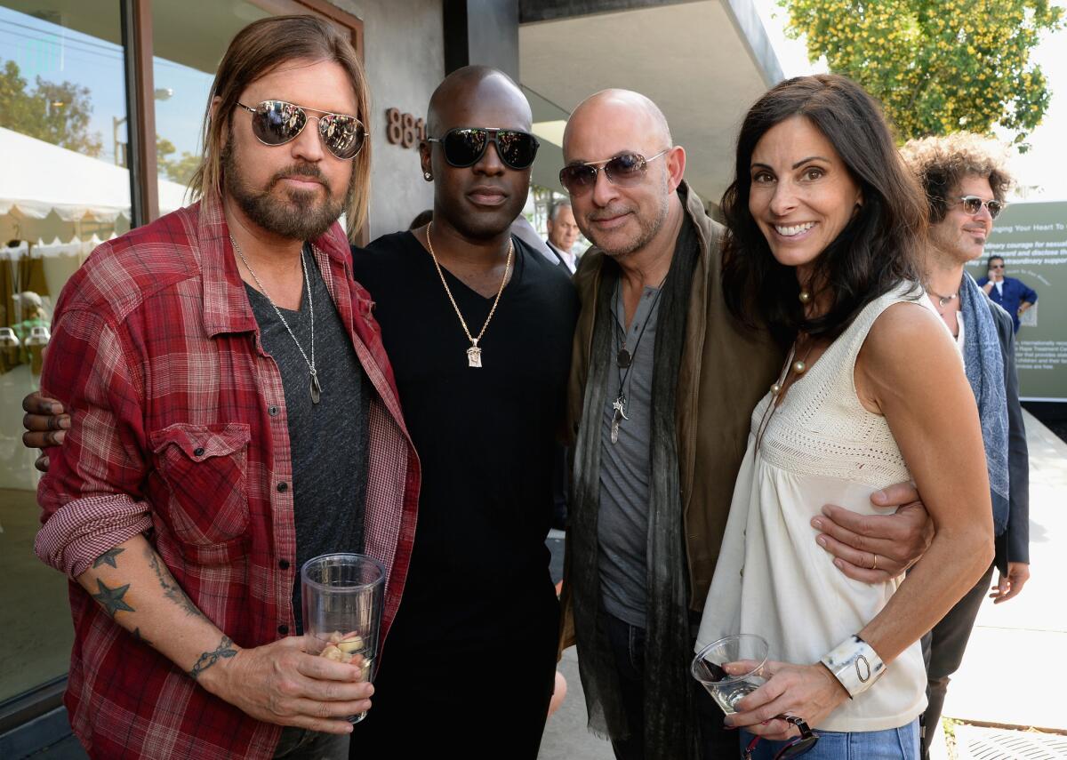 From left, singer Billy Ray Cyrus, music manager Corey Gamble, designer John Varvatos and Joyce Varvatos at last year's Stuart House benefit. This year's event, scheduled for Sunday, is set to include a musical performance by Sammy Hagar.