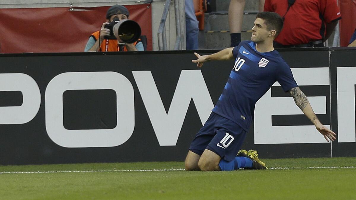 United States' Christian Pulisic celebrates after scoring during the first half against Chile on Tuesday in Houston.