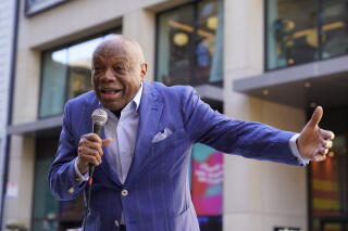 Former San Francisco Mayor Willie Brown speaks outside John's Grill in San Francisco,