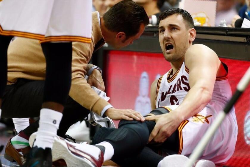 Center Andrew Bogut (6) reacts after breaking his leg in the first half of his debut with the Cleveland Cavaliers in the first half on March 6.