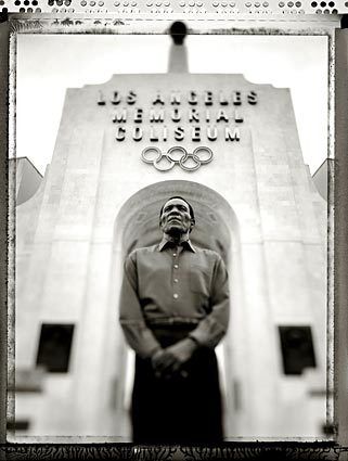 HE STEPPED UP: Rafer Johnson, who ran a leg in the 1984 torch relay, didn't know he would be the final torch-bearer at the Coliseum until the Games' organizer, Peter Ueberroth, told him about 10 days before the opening ceremony.