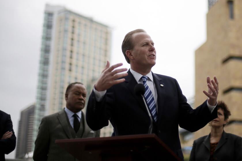 San Diego Mayor Kevin Faulconer addresses the media and football fans on Jan. 30 about the city's efforts to build a new stadium for the San Diego Chargers.