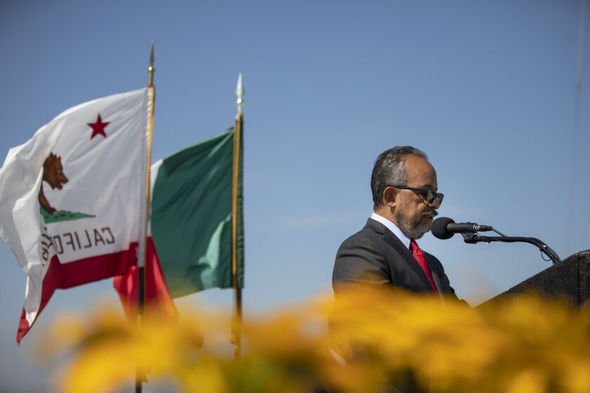 Otay Mesa, California - July 26: Carlos Gonzalez Gutierrez, Consul general of Mexico in San Diego, speaks to United States and Mexican Government officials during an event that celebrates the completion of the southbound State Route 125 to westbound State Route 905 on Tuesday, July 26, 2022 in Otay Mesa, California. The connector will improve mobility throughout the region. The next project will be a new port of entry which is expected to be completed by 2024. (Ana Ramirez / The San Diego Union-Tribune)