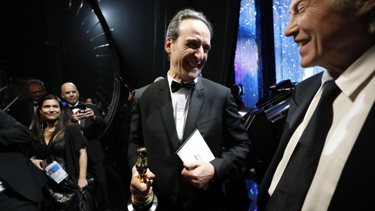 Alexandre Desplat after winning for original score for "The Shape of Water," backstage at the 90th Academy Awards on Sunday at the Dolby Theatre in Hollywood.