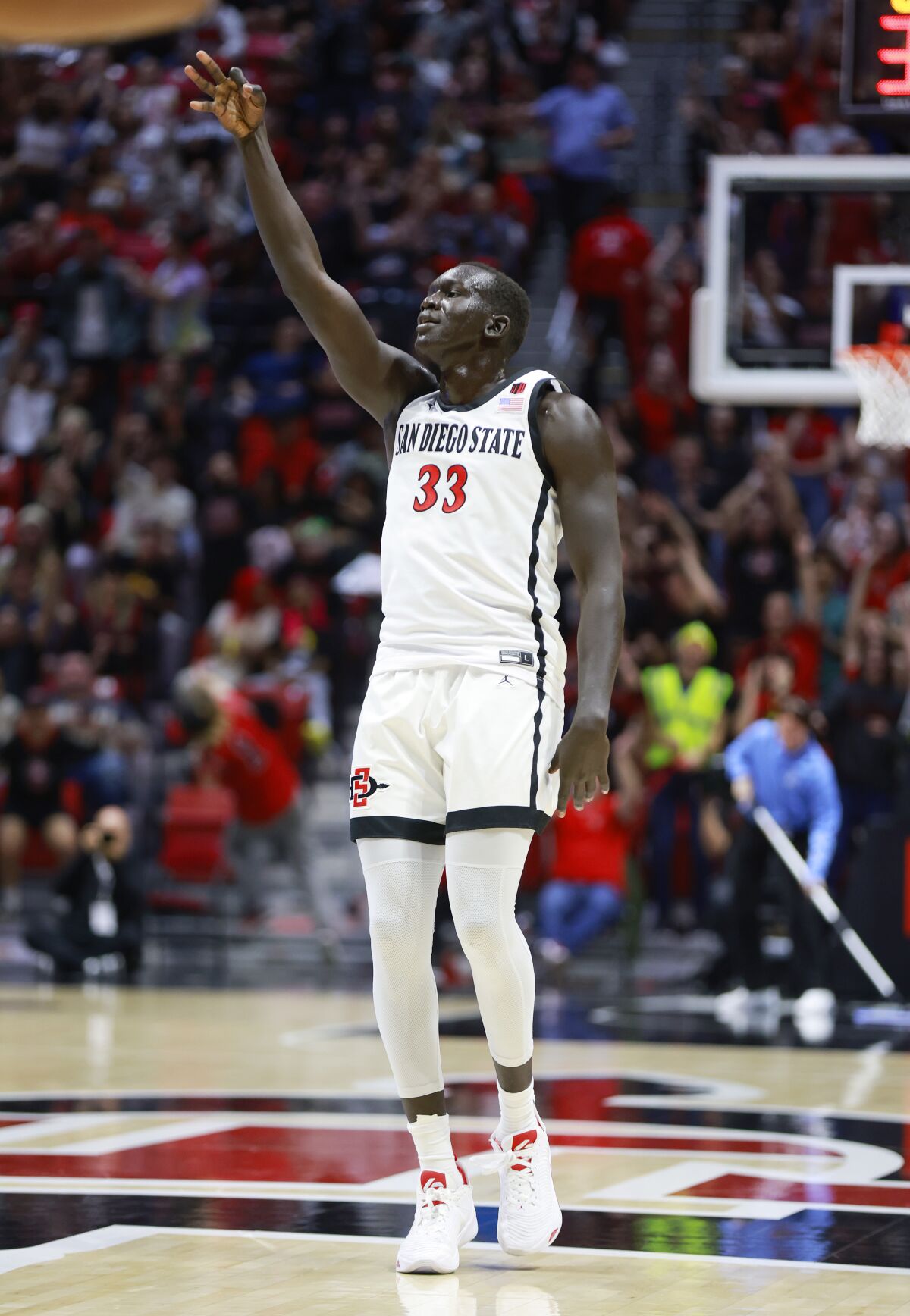 San Diego State's Aguek Arop celebrates after making a three-pointer against Boise State.