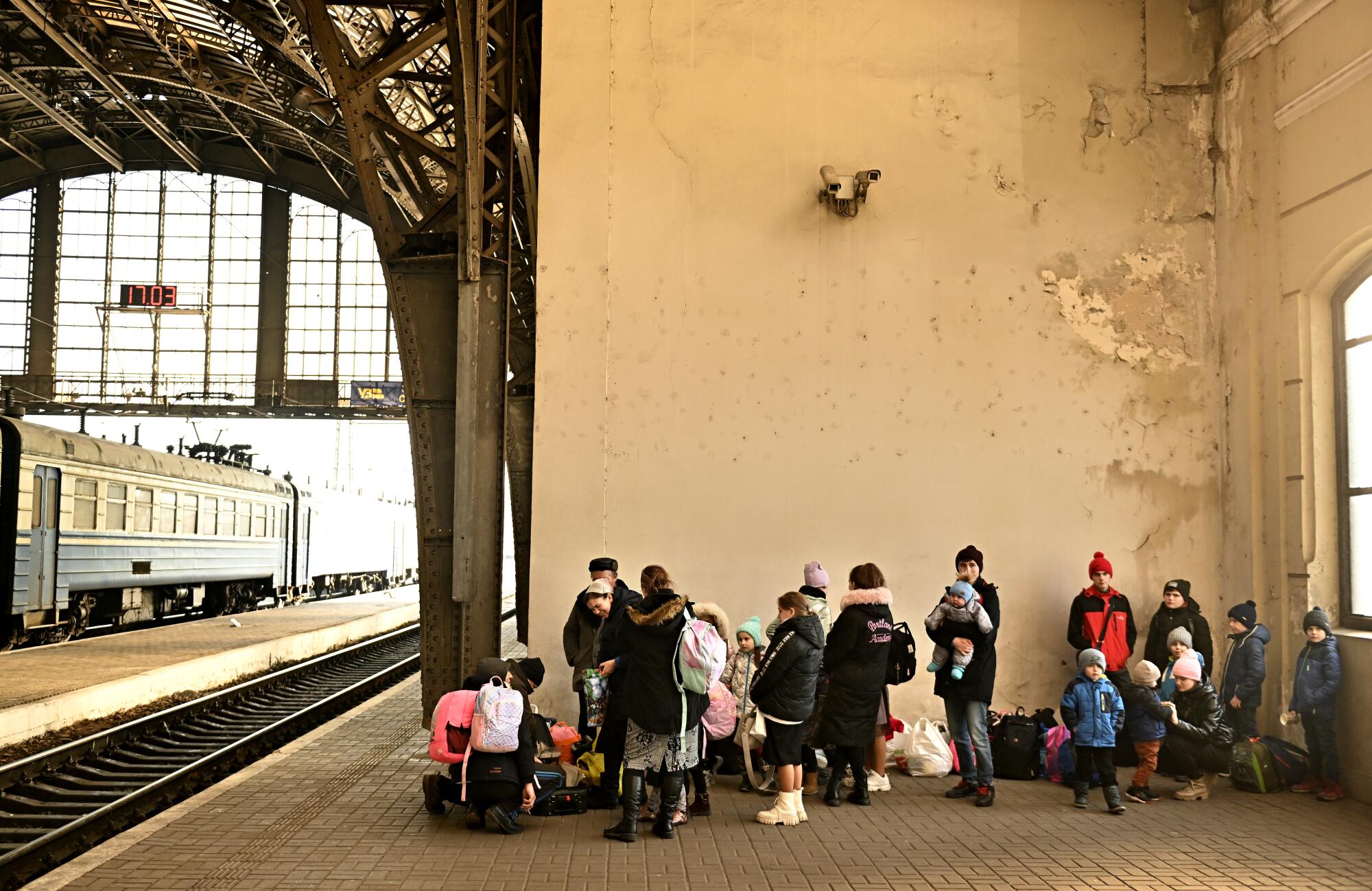 Refugees wait for the next train in Lviv, Ukraine trying to flee to Przemysl, Poland.
