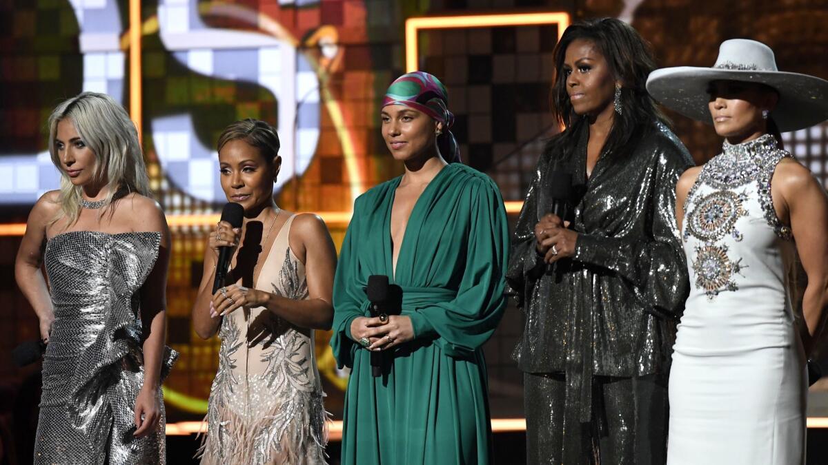 Lady Gaga, left, Jada Pinkett Smith, Alicia Keys, Michelle Obama and Jennifer Lopez at the 61st Grammy Awards