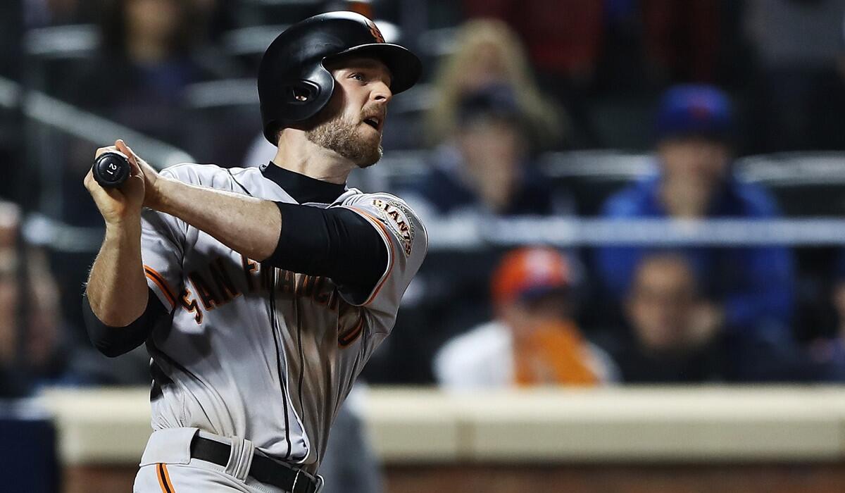 San Francisco Giants' Conor Gillaspie hits a three-run homerun in the ninth inning against the New York Mets during the NL Wild Card game Wednesday.