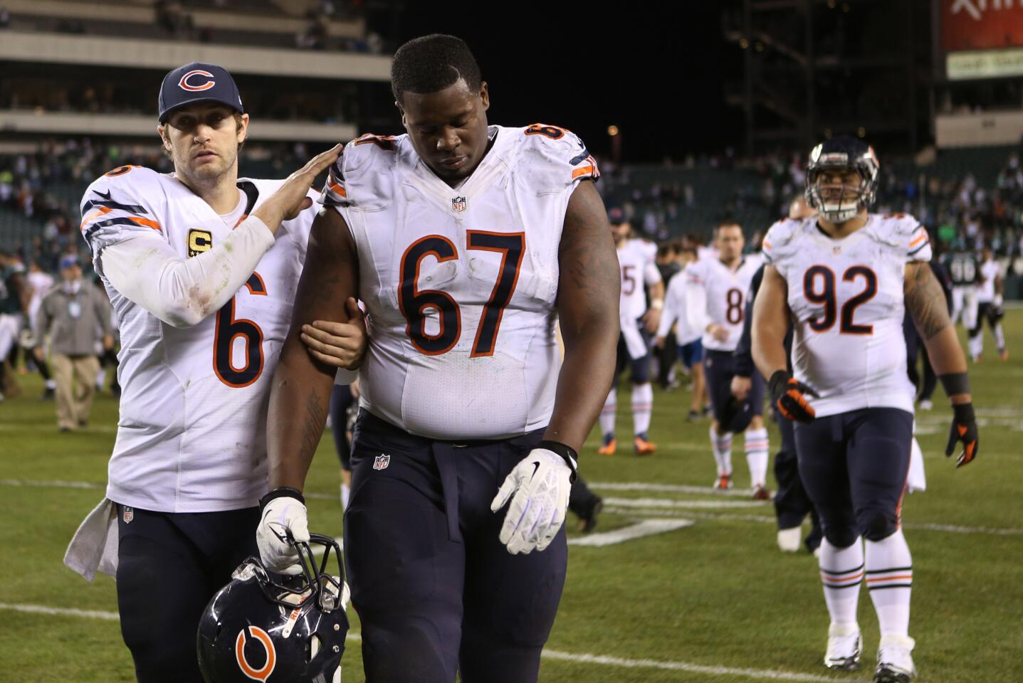Jay Cutler consoles offensive tackle Jordan Mills after the loss.