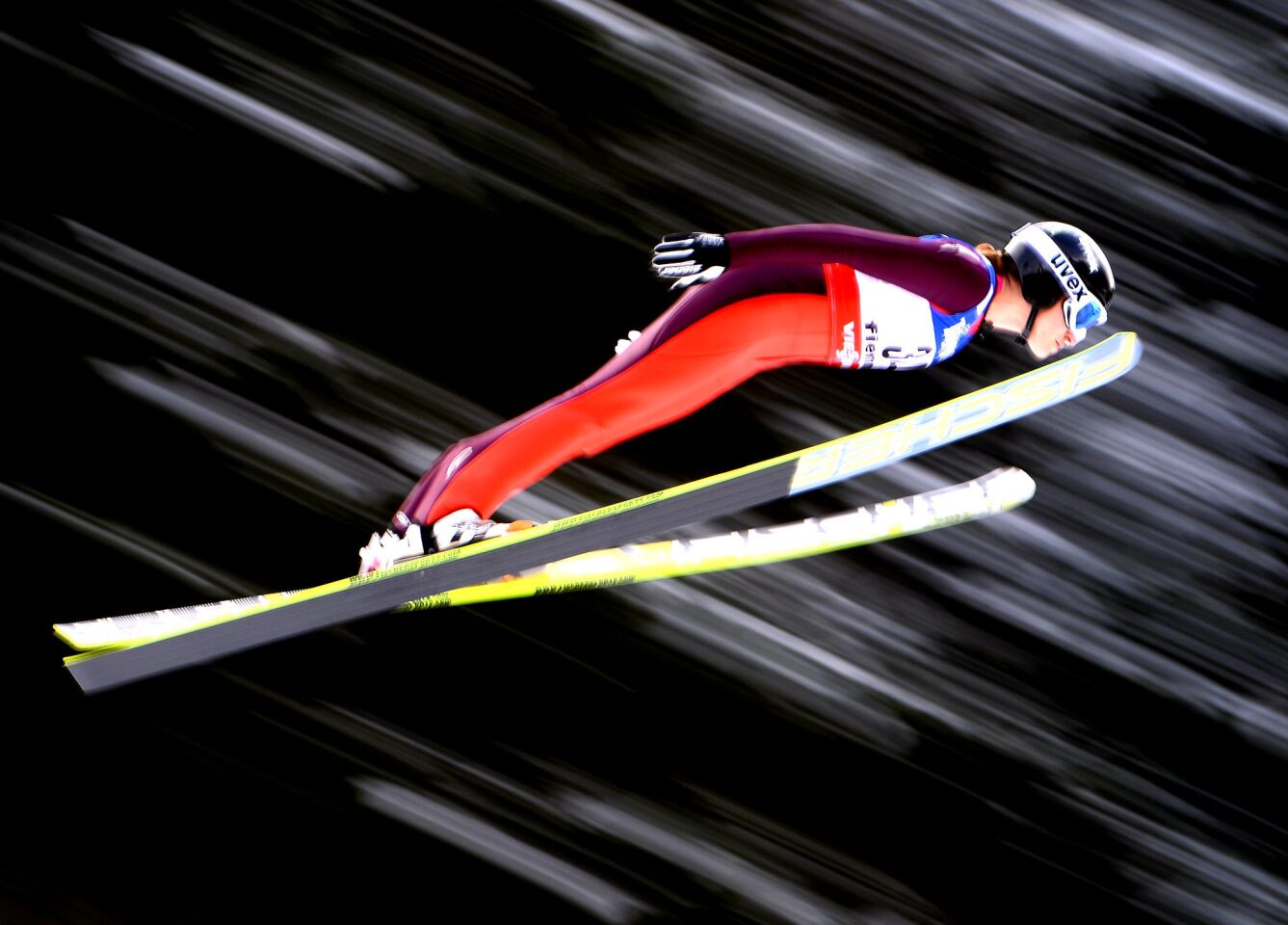 Jessica Jerome launches through the air during the Women's Ski Jumping HS106 Trial Round at the FIS Nordic World Ski Championships on Feb. 22 in Val di Fiemme, Italy.