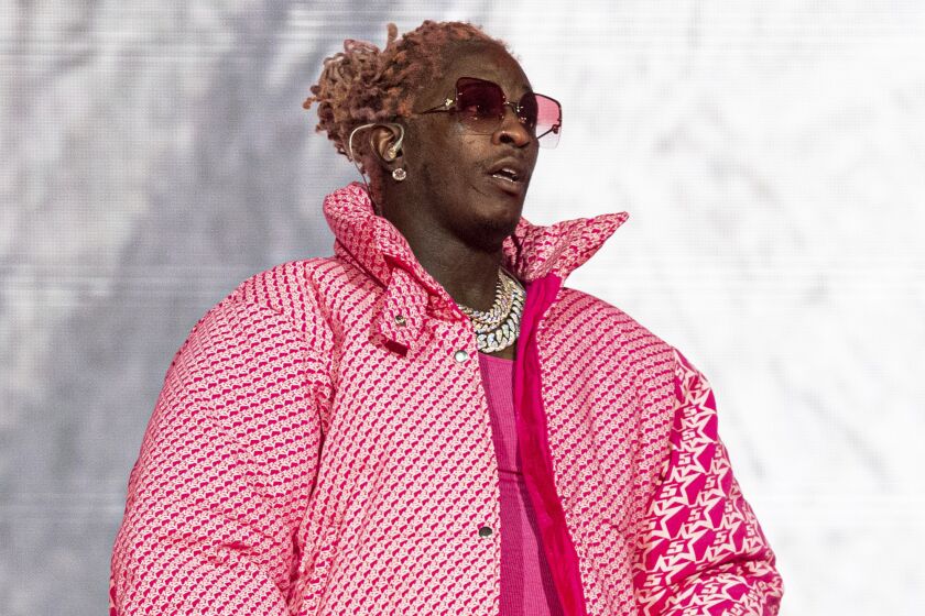 FILE - Young Thug performs at the Lollapalooza Music Festival in Chicago on Aug. 1, 2021. The rapper says that an apartment concierge let an unknown person take his Louis Vuitton bag holding jewelry, money and about 200 unreleased songs. (Photo by Amy Harris/Invision/AP, File)