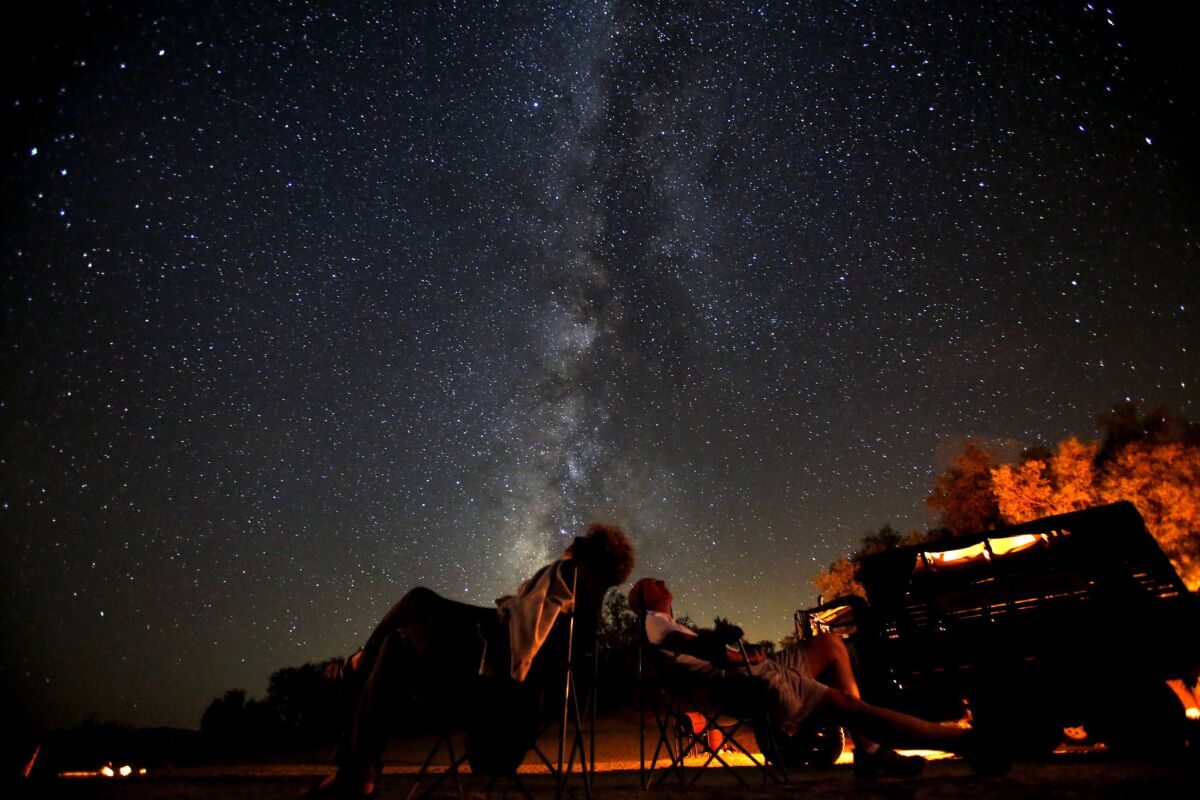 Sue and John Schafer wait for the Perseid meteor shower to unfold from Anzo-Borrego Desert State Park in 2013.