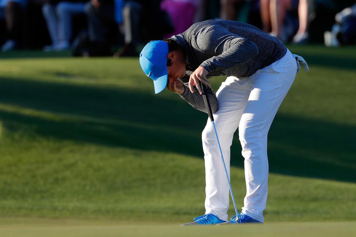 Rory McIlroy reacts to a missed birdie putt on the 17th green during the third round of the Masters.