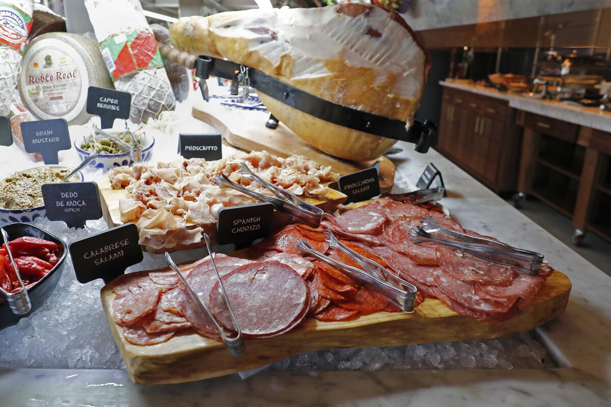 The Market Table at the Irvine Spectrum Center's new Fogo de Ch?o churrascaria in the Irvine Spectrum Center offers various salami.
