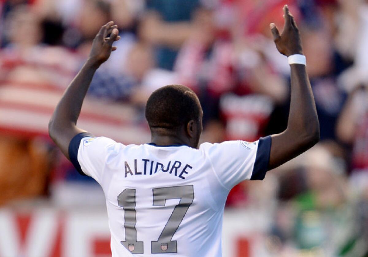 USA's Jozy Altidore celebrates after scoring a goal against Honduras during the World Cup qualifier at Rio Tinto Stadium in Sandy, Utah.